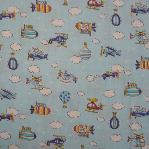 Picture of Light blue double gauze with planes, balloons and clouds