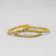 Picture of Femina Hills' delicate gold-plated antique bracelets